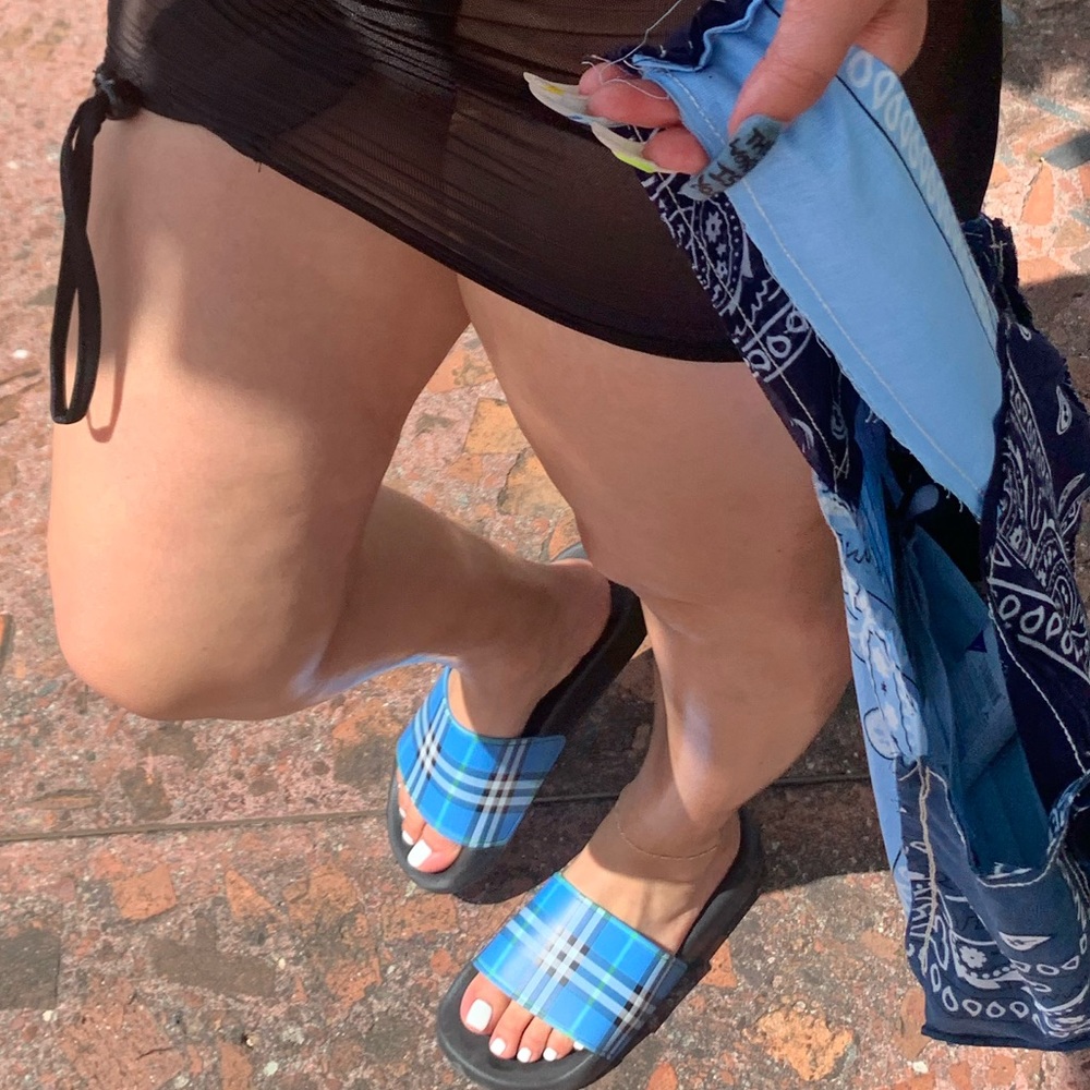 Authentic women’s blue Burberry check slides